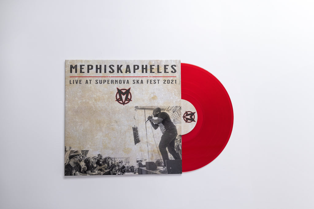 Mephiskapheles 'Live at Superova Ska Fest 2021' vinyl record with a beige illustrated sleeve and a translucent red record partially visible behind it on a light gray background.
